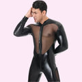 Man wearing a black shiny bodysuit with mesh panels on a white background