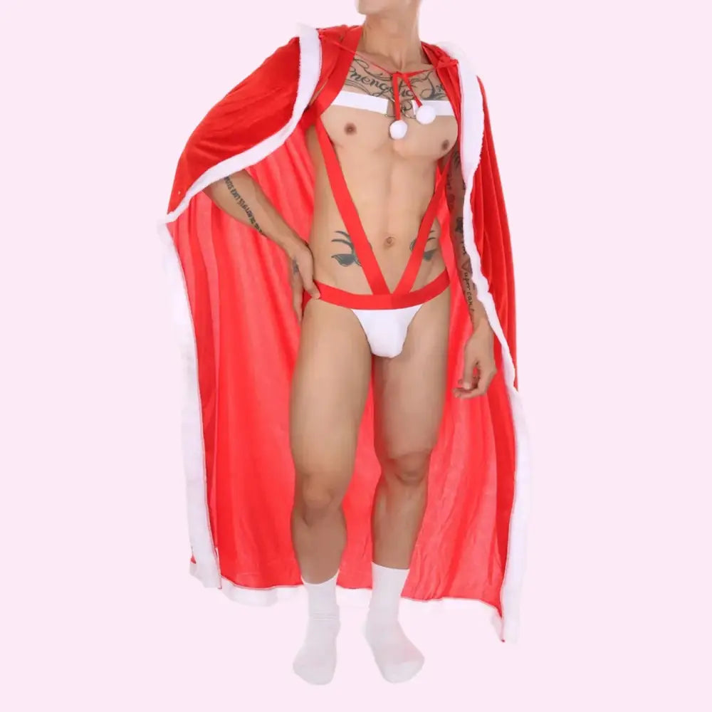 Male wearing a red cape and white underwear on a white background