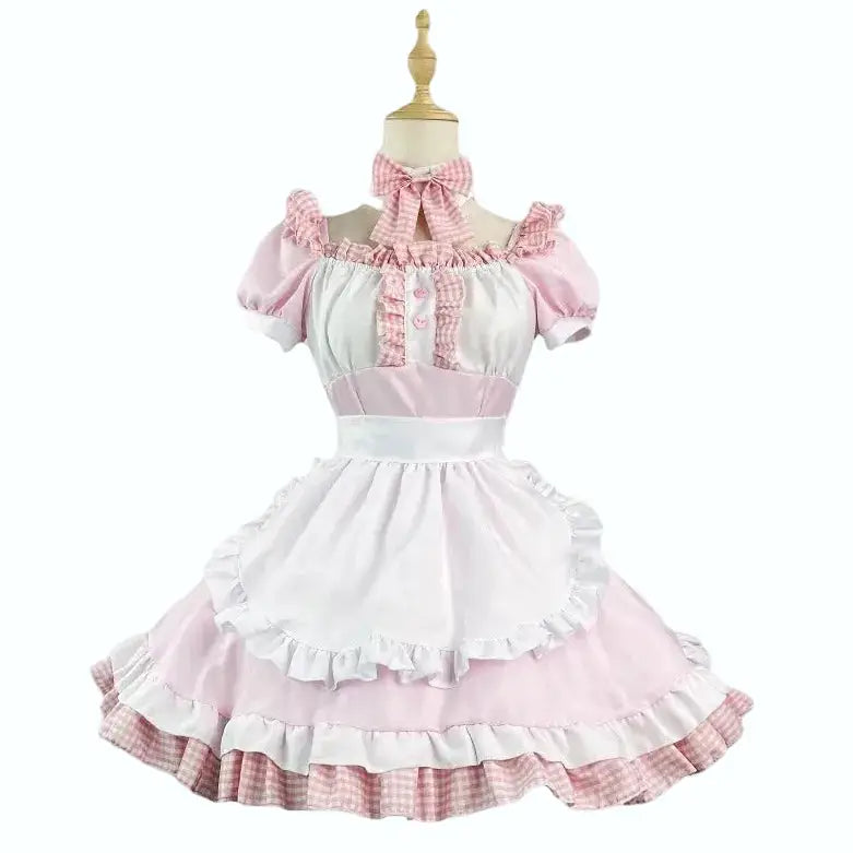 Pink and white checkered dress on a mannequin with a white background