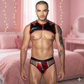 Man wearing a black and red harness in a bedroom setting